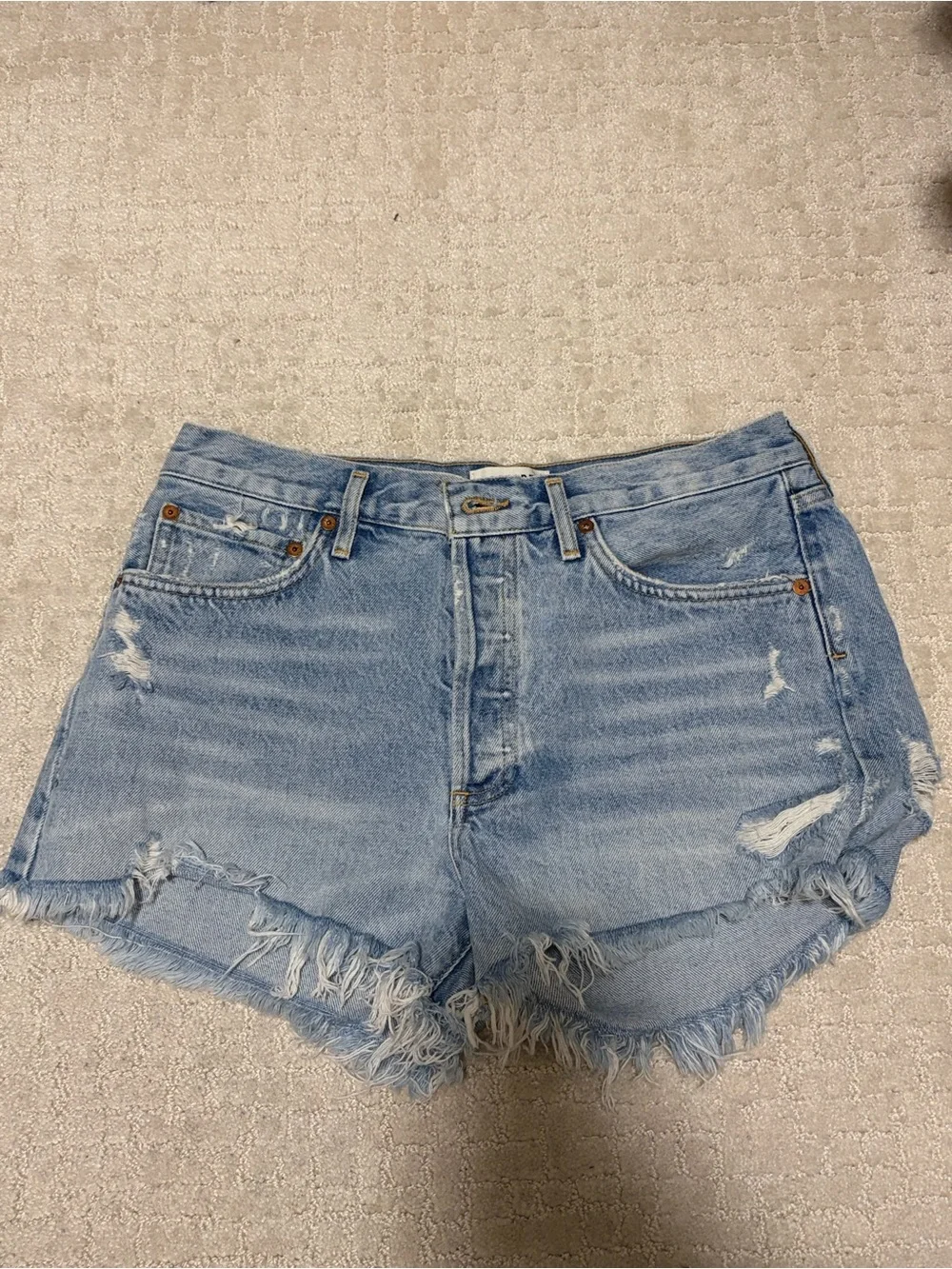 Agolde Parker Long Light Blue Distressed Denim Shorts